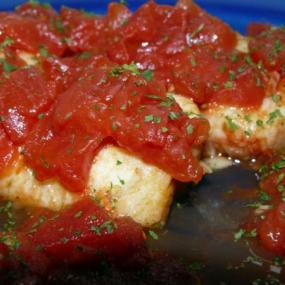 Merluza con tomate